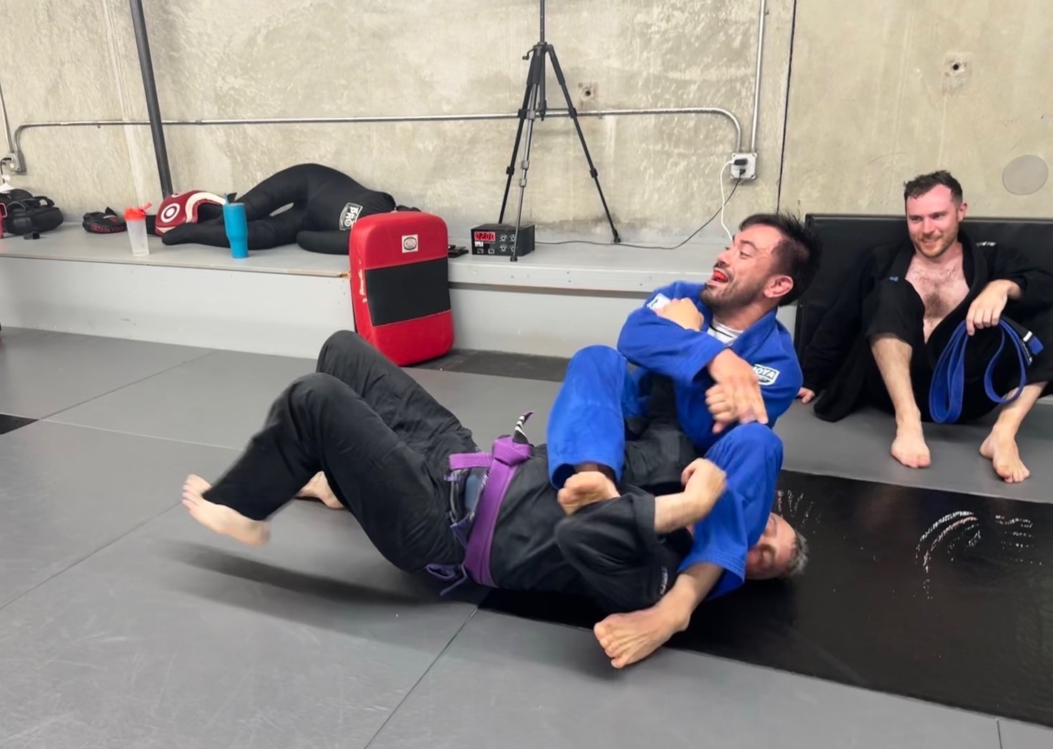 Students after a promotion ceremony at Hybrid Gym