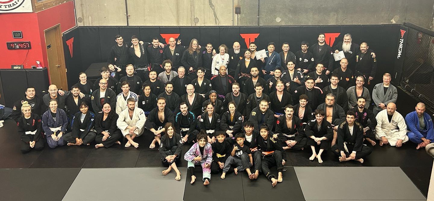 Students after a promotion ceremony at Hybrid Gym